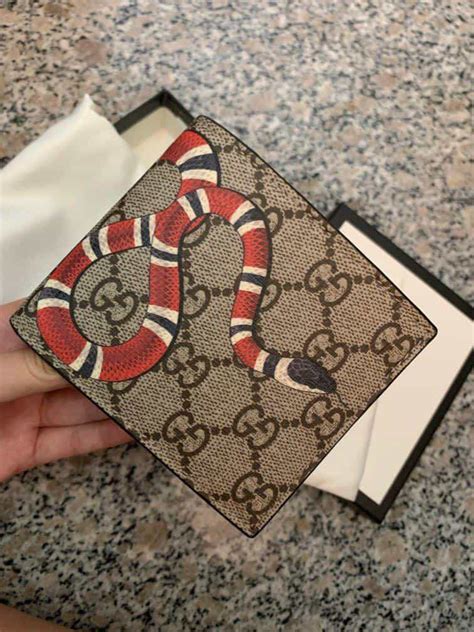 gucci mens wallet fake|authentic gucci snake wallet.